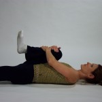 supine 1 knee to chest stretch