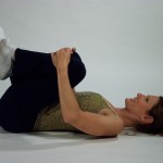 Supine back stretch knees to chest